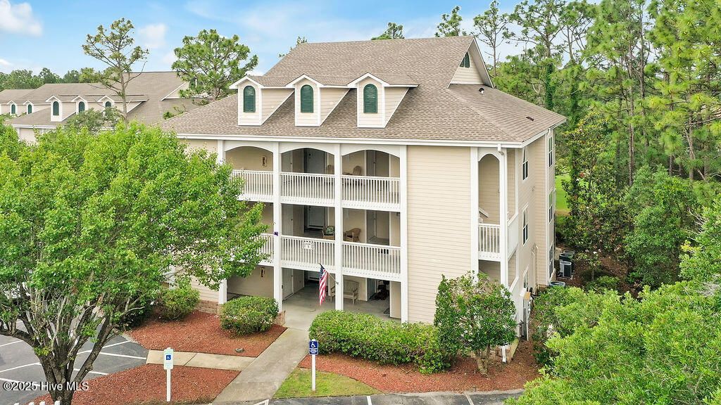 Photo of 3350 Club Villas Drive # 105, Southport, NC 28461 (MLS # 100554585)