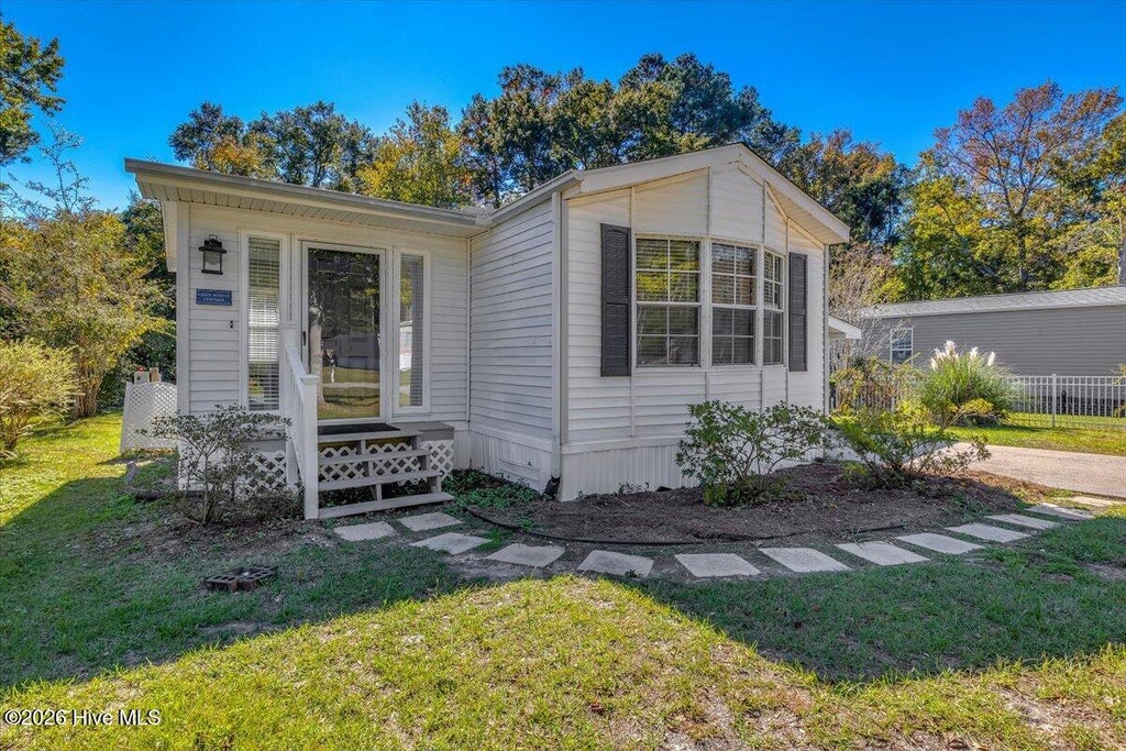 Photo of 520 Magnolia Drive, Sunset Beach, NC 28468 (MLS # 100613297)