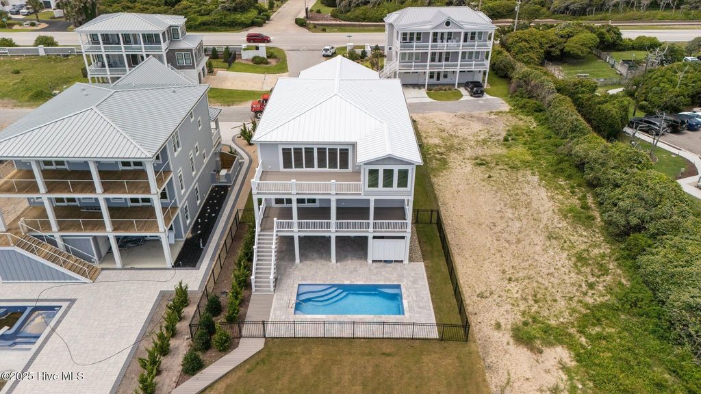 Photo of 105 Roosevelt Drive, Pine Knoll Shores, NC 28512 (MLS # 100514382)