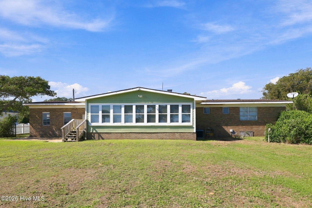 Photo of 563 Neptune Drive, Cape Carteret, NC 28584 (MLS # 100604603)