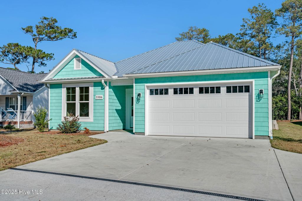 Photo of 3506 E Oak Island Drive, Oak Island, NC 28465 (MLS # 100460470)