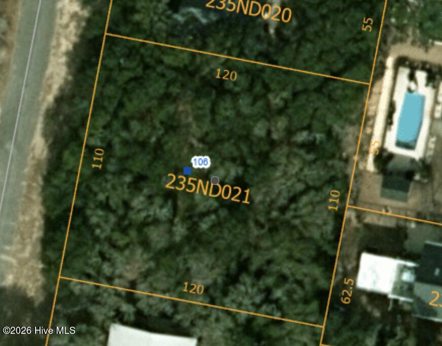 Photo of 106 SE 37th Street, Oak Island, NC 28465 (MLS # 100612636)