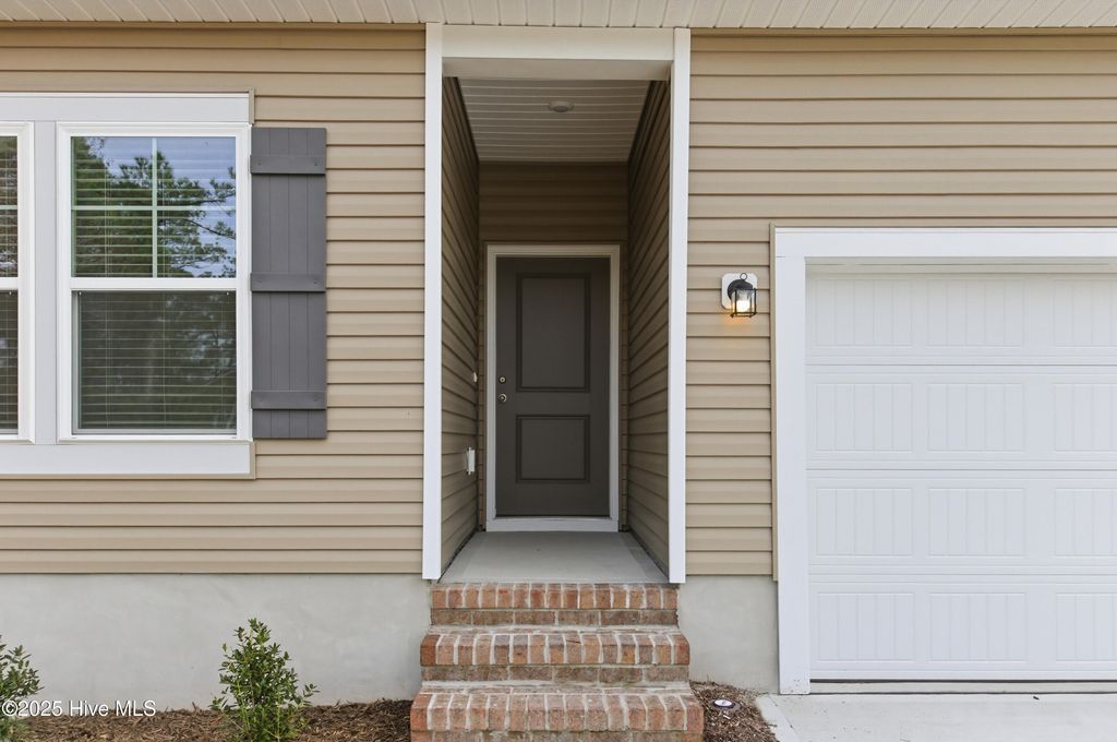 Photo of 716 Helm Drive, New Bern, NC 28560 (MLS # 100517872)