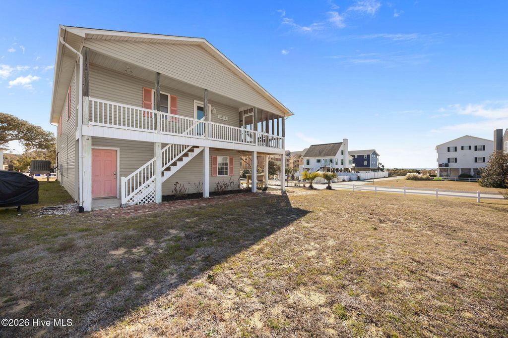 Photo of 100 Ocean Drive, Oak Island, NC 28465 (MLS # 100553984)