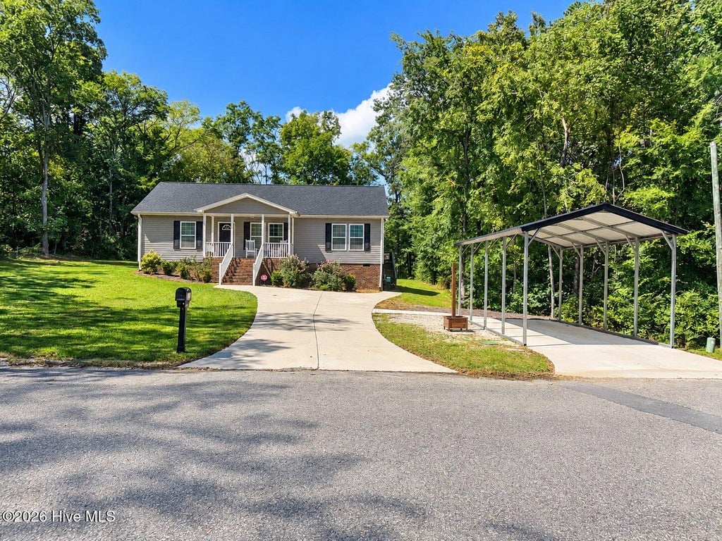 Photo of 205 Lake Drive, Biscoe, NC 27209 (MLS # 100603879)