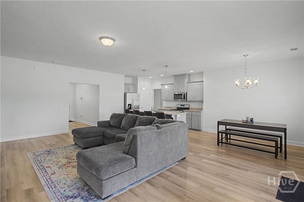 Photo of 413 NE McClelland Loop, Ludowici, GA 31316 (MLS # SA351335)