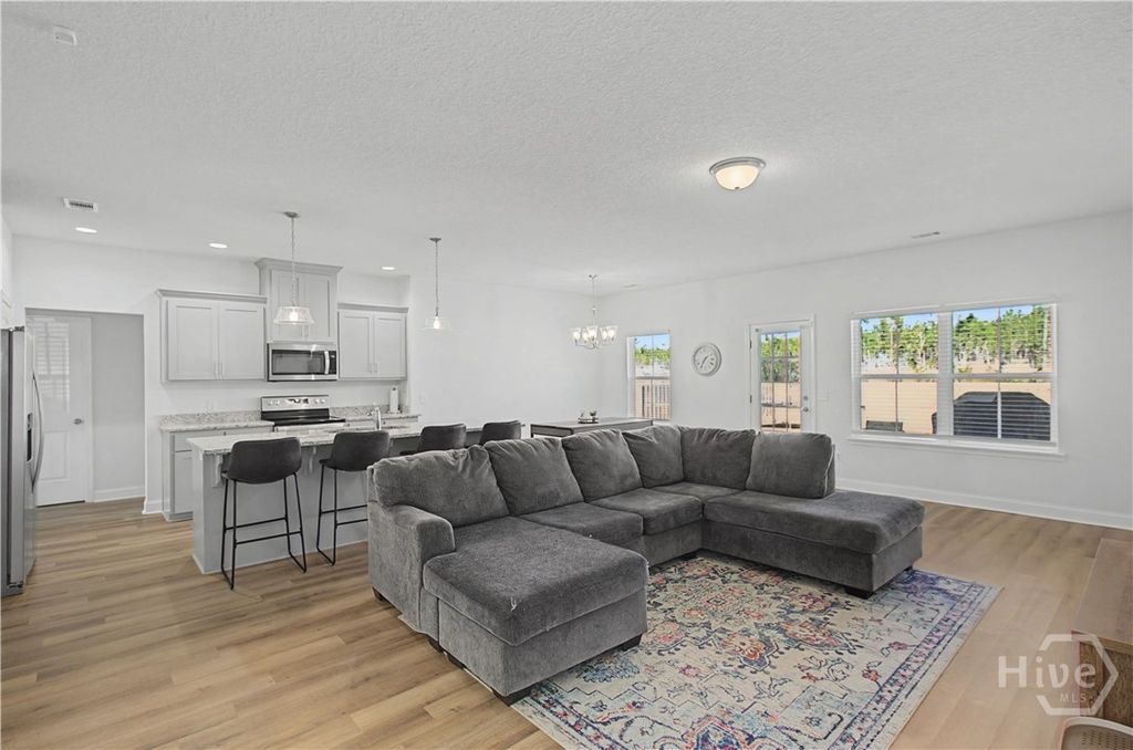 Photo of 413 NE McClelland Loop, Ludowici, GA 31316 (MLS # SA351335)