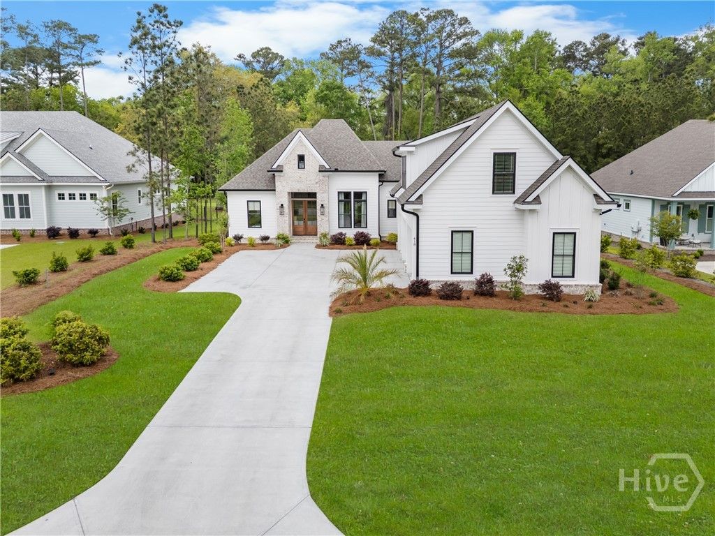 Photo of 418 Enclave Drive, Richmond Hill, GA 31324 (MLS # SA352835)