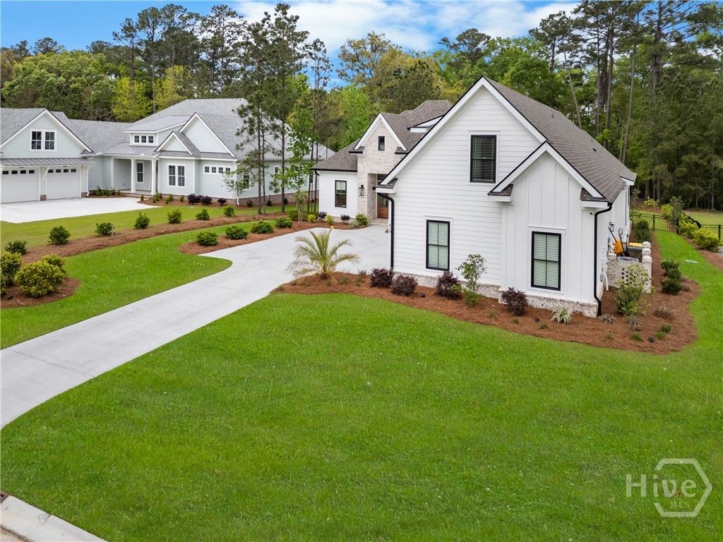 Photo of 418 Enclave Drive, Richmond Hill, GA 31324 (MLS # SA352835)