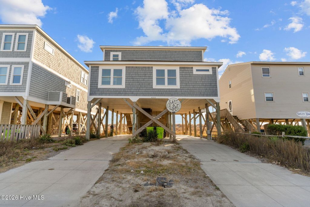 Photo of 4321 E Beach Drive, Oak Island, NC 28465 (MLS # 100575721)