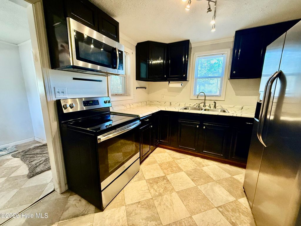 Photo of 405 McKinnon Street, Hamlet, NC 28345 (MLS # 100551785)