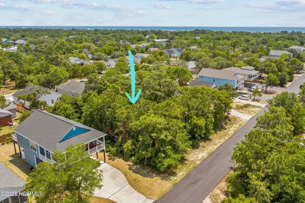 Photo of 150 NE 8th Street, Oak Island, NC 28465 (MLS # 100546554)