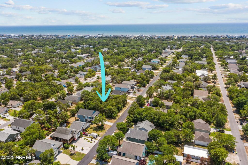 Photo of 150 NE 8th Street, Oak Island, NC 28465 (MLS # 100546554)