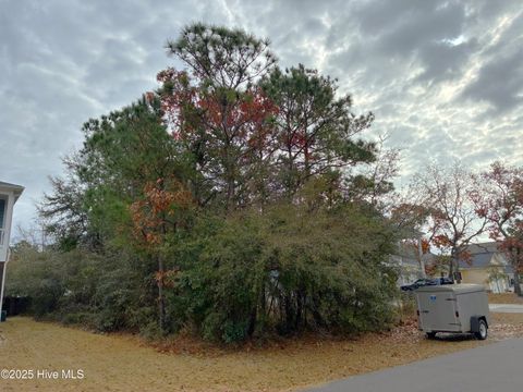 Tiny photo for 150 NE 8th Street, Oak Island, NC 28465 (MLS # 100546554)