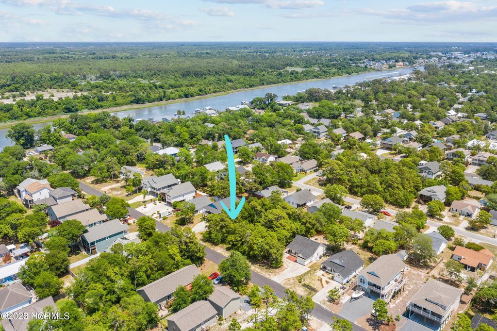 Photo of 150 NE 8th Street, Oak Island, NC 28465 (MLS # 100546554)