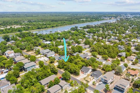Photo of 150 NE 8th Street, Oak Island, NC 28465 (MLS # 100546554)