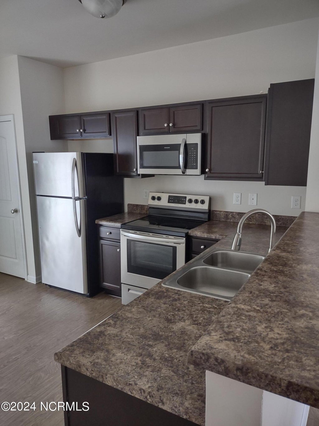 Photo of 126 Beacon Woods Drive, Holly Ridge, NC 28445 (MLS # 100607292)