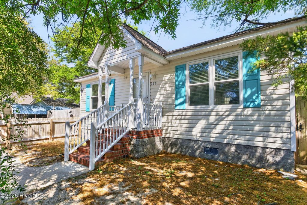 Photo of 220 NE 33rd Street, Oak Island, NC 28465 (MLS # 100568924)