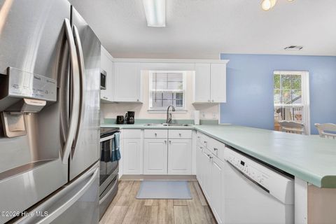 Tiny photo for 220 NE 33rd Street, Oak Island, NC 28465 (MLS # 100568924)