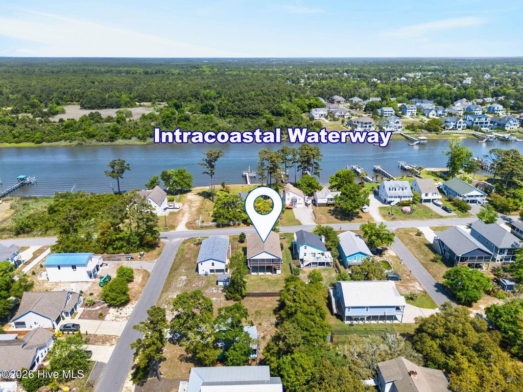 Photo of 1903 E Yacht Drive, Oak Island, NC 28465 (MLS # 100568136)