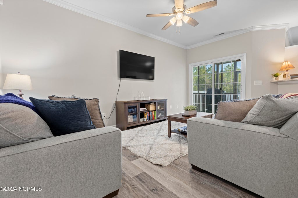 Photo of 301 Cedar Island Trail, Holly Ridge, NC 28445 (MLS # 100597896)