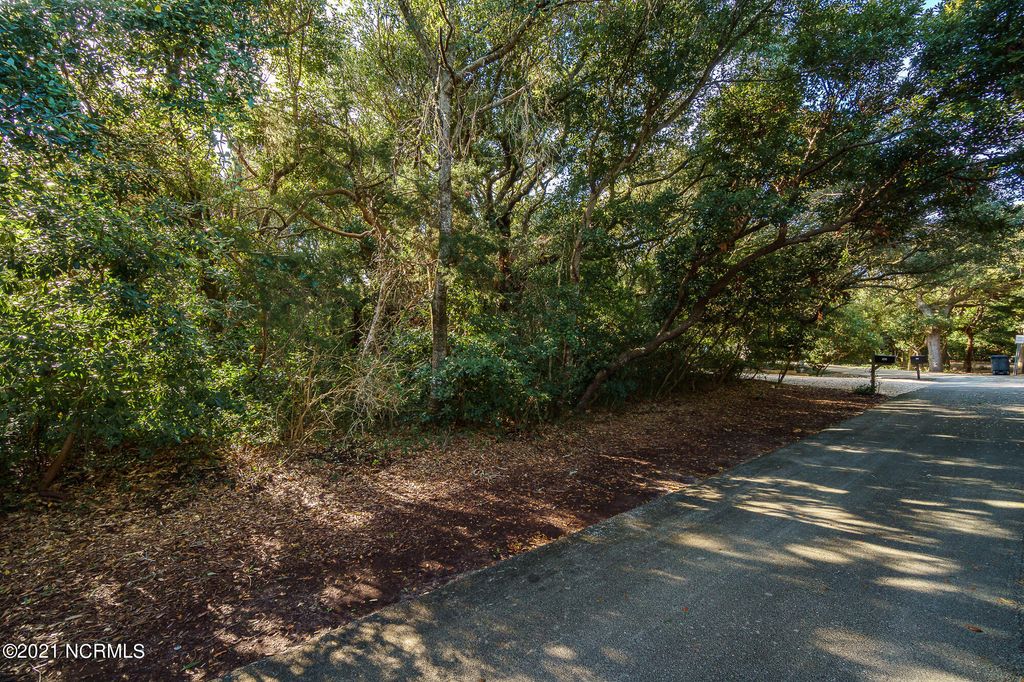 Photo of 581 Forest Dunes Drive, Pine Knoll Shores, NC 28512 (MLS # 100591035)