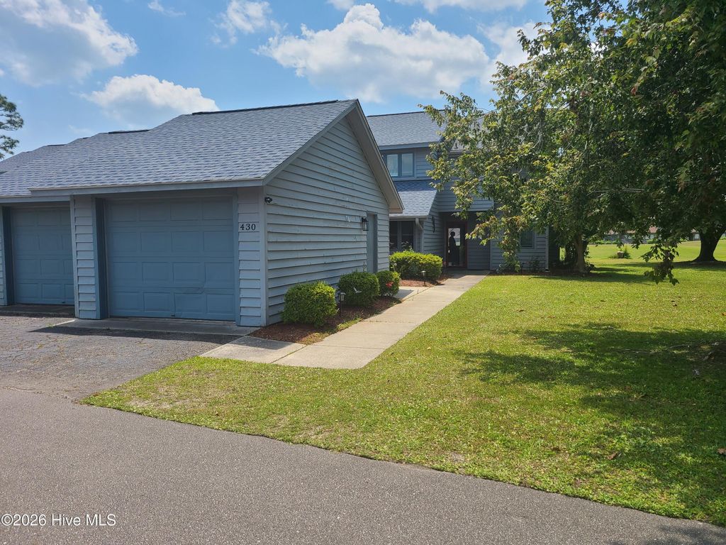 Photo of 430 Widgeon Drive, Hampstead, NC 28443 (MLS # 100568886)