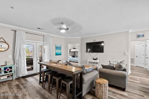 Tiny photo for 100 Gateway Condos Drive #Unit 115, Surf City, NC 28445 (MLS # 100555368)