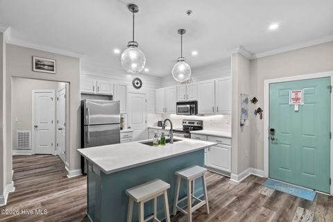 Tiny photo for 100 Gateway Condos Drive #Unit 115, Surf City, NC 28445 (MLS # 100555368)