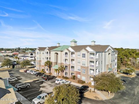 Tiny photo for 100 Gateway Condos Drive #Unit 115, Surf City, NC 28445 (MLS # 100555368)