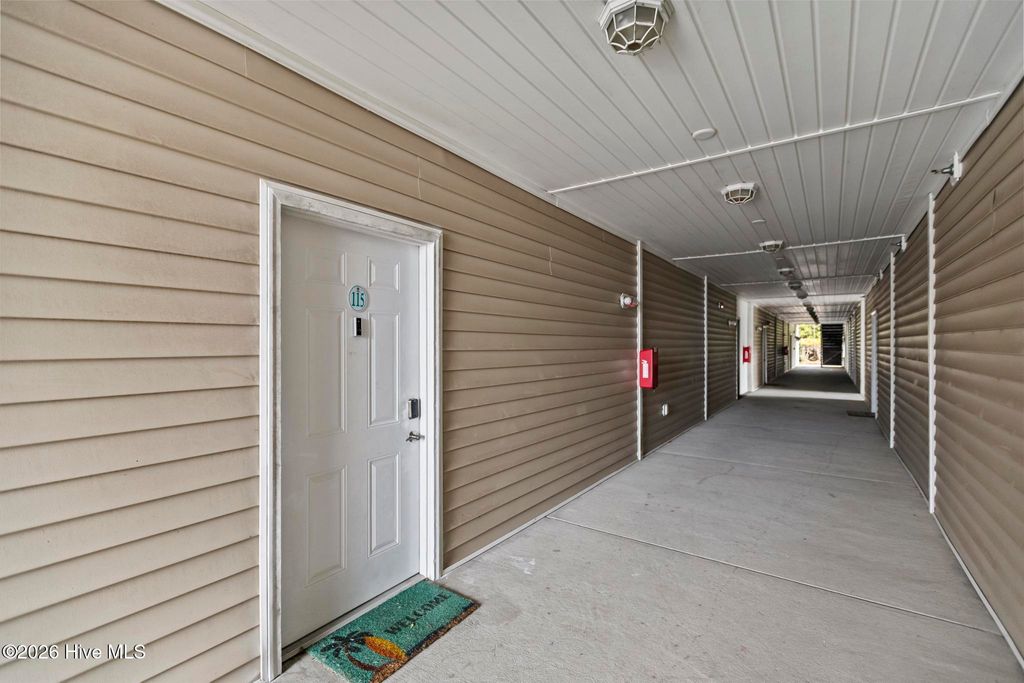 Photo of 100 Gateway Condos Drive #Unit 115, Surf City, NC 28445 (MLS # 100555368)