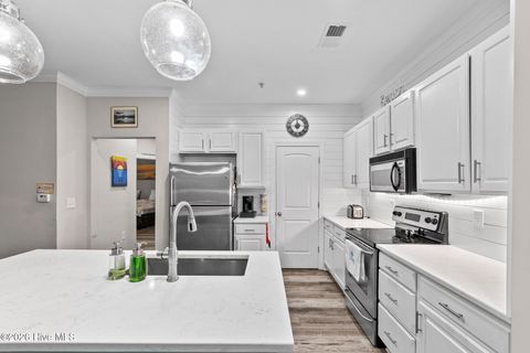 Tiny photo for 100 Gateway Condos Drive #Unit 115, Surf City, NC 28445 (MLS # 100555368)