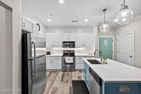 Tiny photo for 100 Gateway Condos Drive #Unit 115, Surf City, NC 28445 (MLS # 100555368)