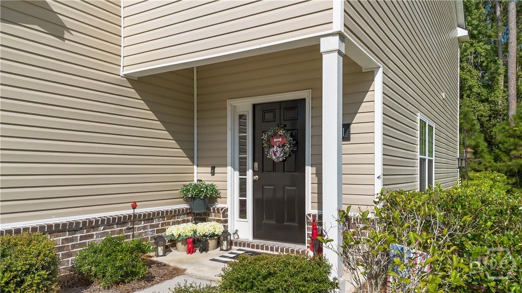 Photo of 201 Ainsdale Drive, Richmond Hill, GA 31324 (MLS # SA365006)