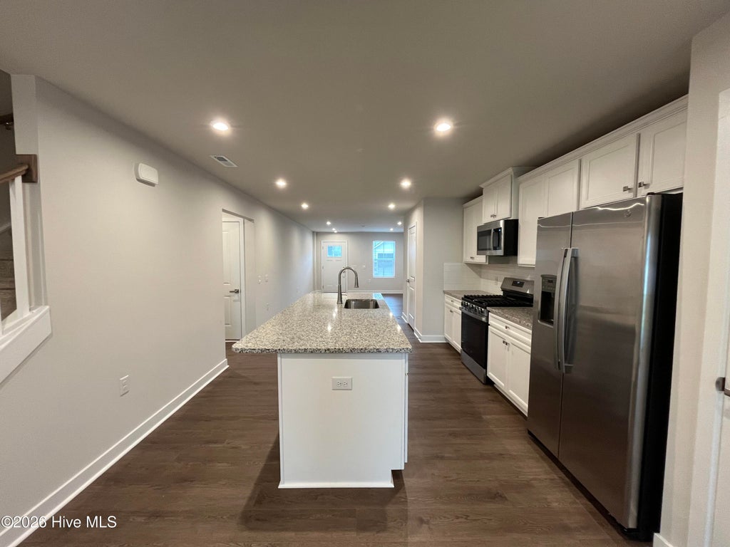 Photo of 4184 Farmfield Drive, Navassa, NC 28451 (MLS # 100601574)
