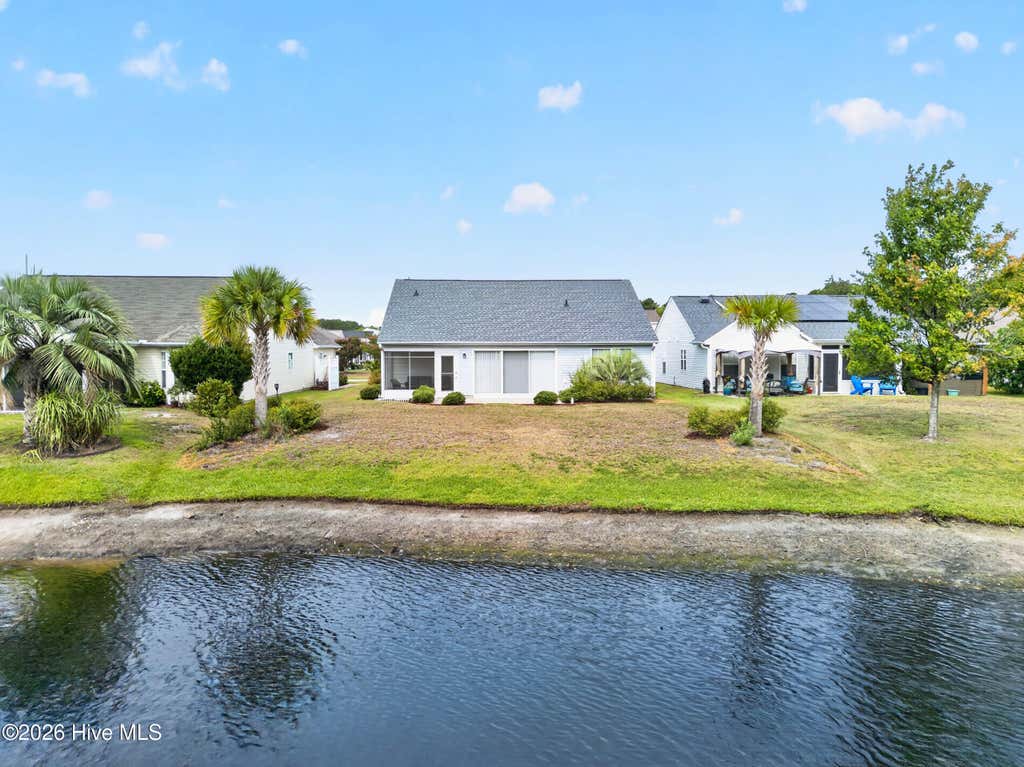 Photo of 907 Wyndfall Drive SW, Sunset Beach, NC 28468 (MLS # 100591528)