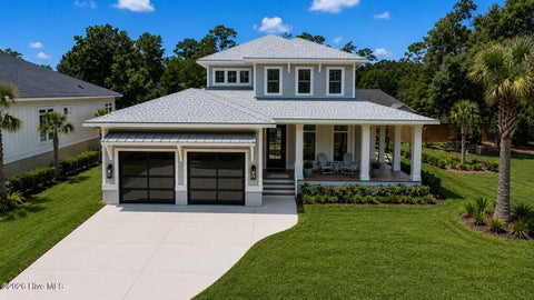 Photo of 58 E Wayfinder Lane, Hampstead, NC 28443 (MLS # 100605207)