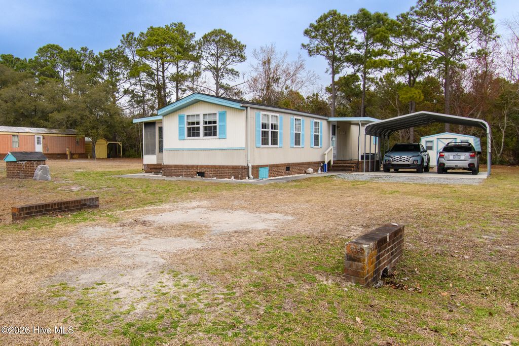 Photo of 1602 Pelican Place SW, Shallotte, NC 28470 (MLS # 100558747)