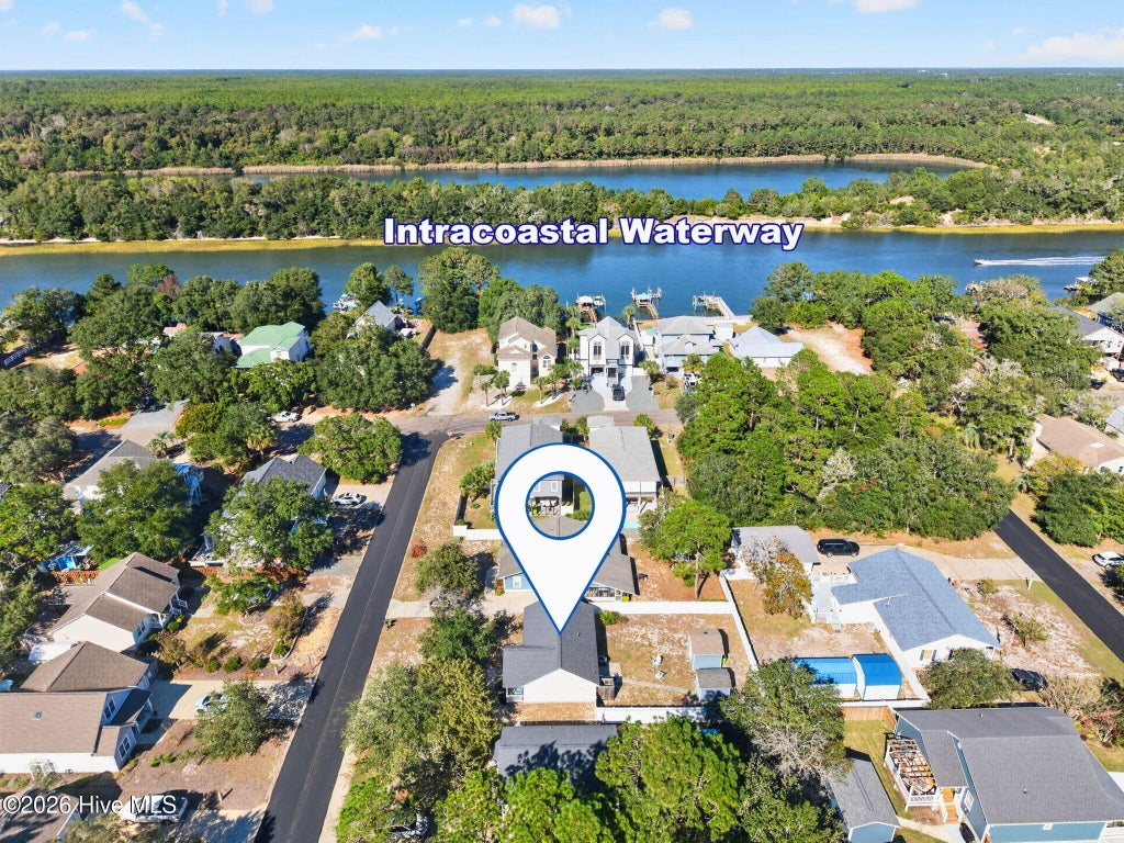 Photo of 170 NW 5th Street, Oak Island, NC 28465 (MLS # 100611802)