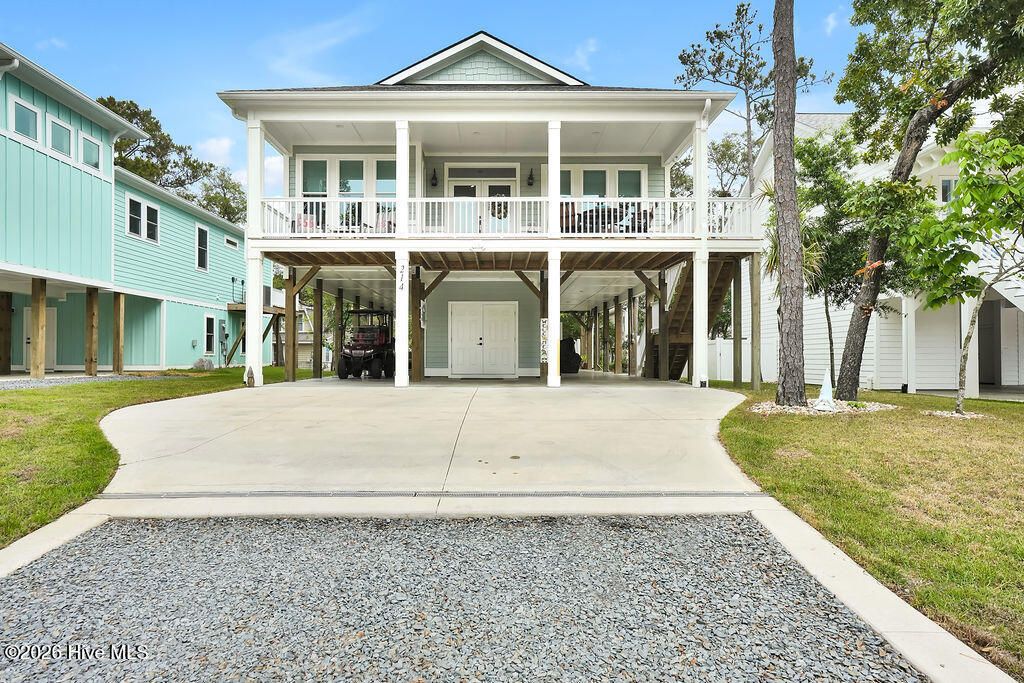 Photo of 214 NE 37th Street, Oak Island, NC 28465 (MLS # 100572187)
