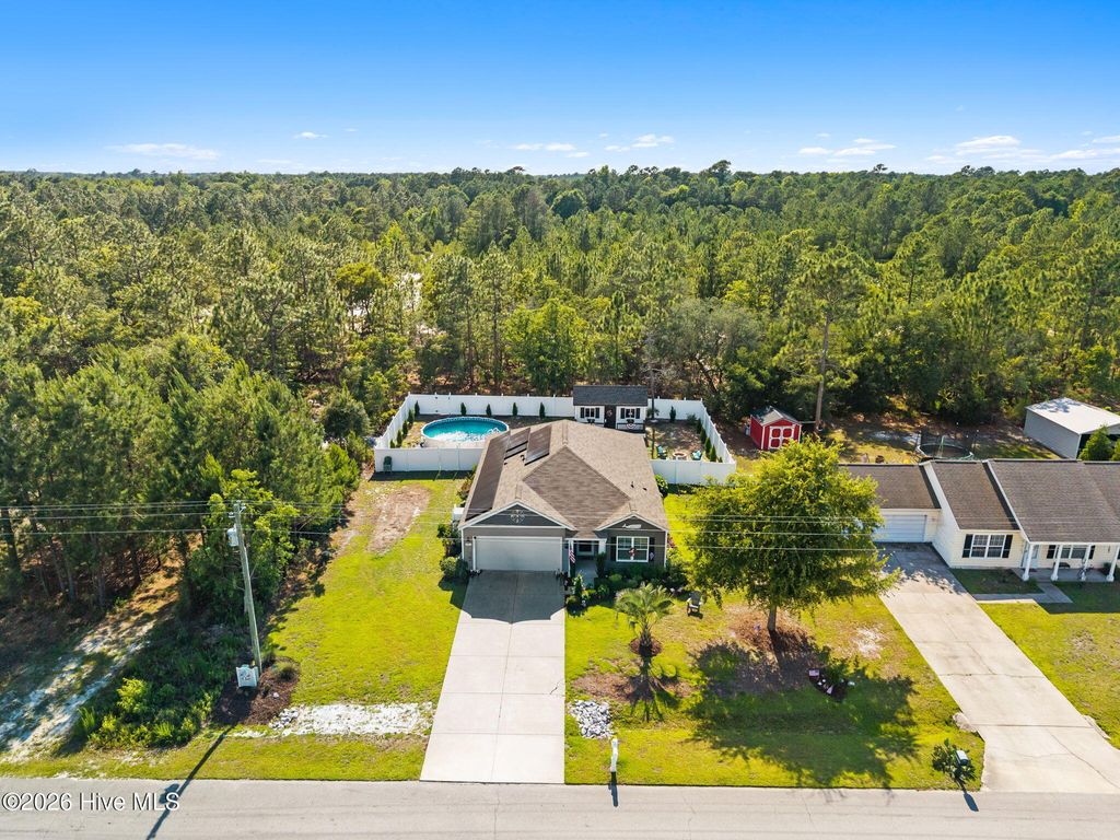 Photo of 405 Red Fox Street NW, Shallotte, NC 28470 (MLS # 100580089)