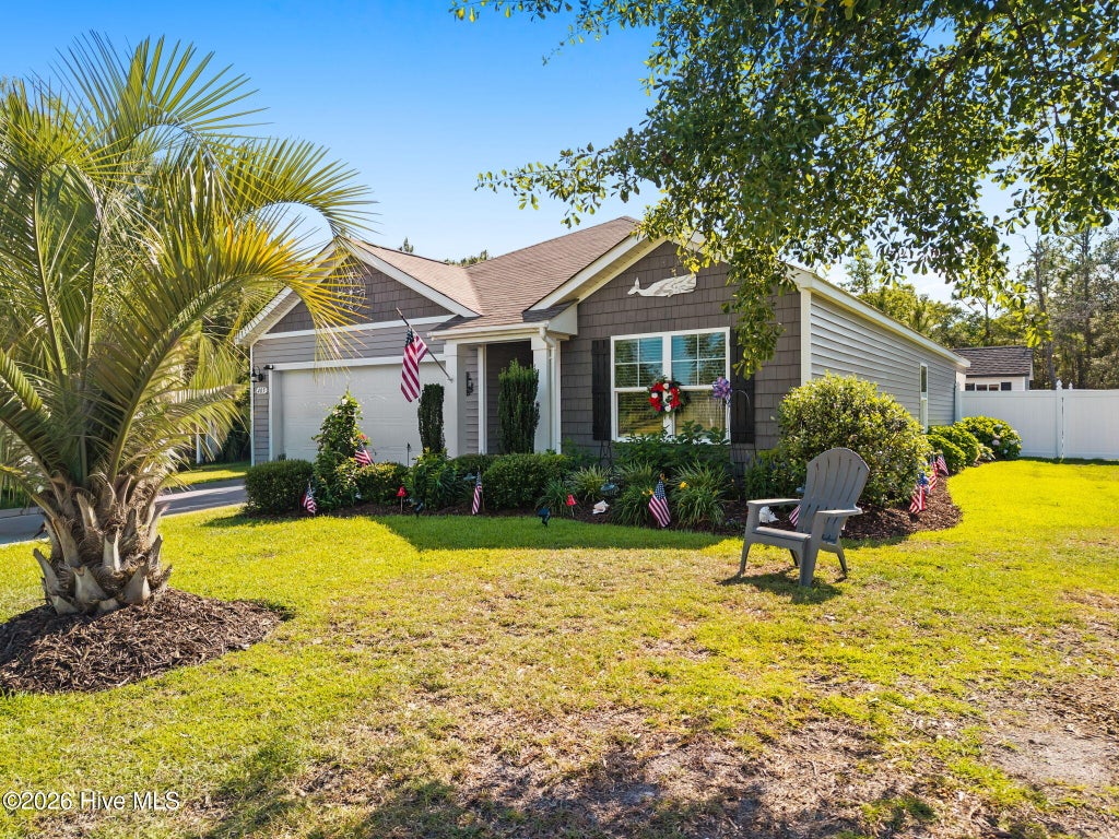 Photo of 405 Red Fox Street NW, Shallotte, NC 28470 (MLS # 100580089)