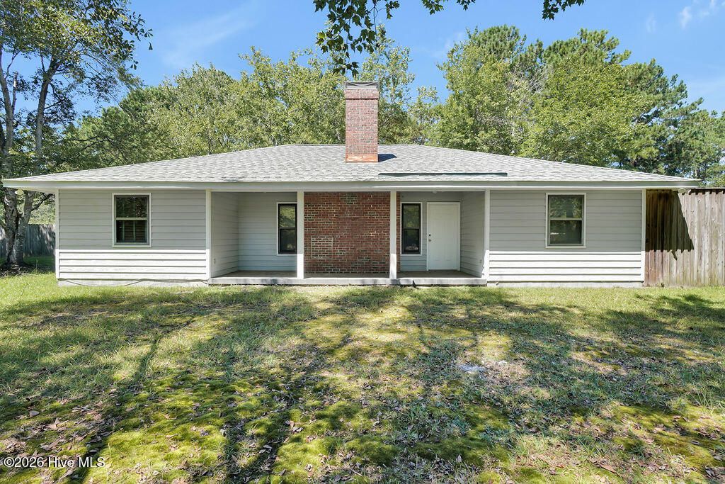 Photo of 207 Whispering Pines Court, Hampstead, NC 28443 (MLS # 100557409)