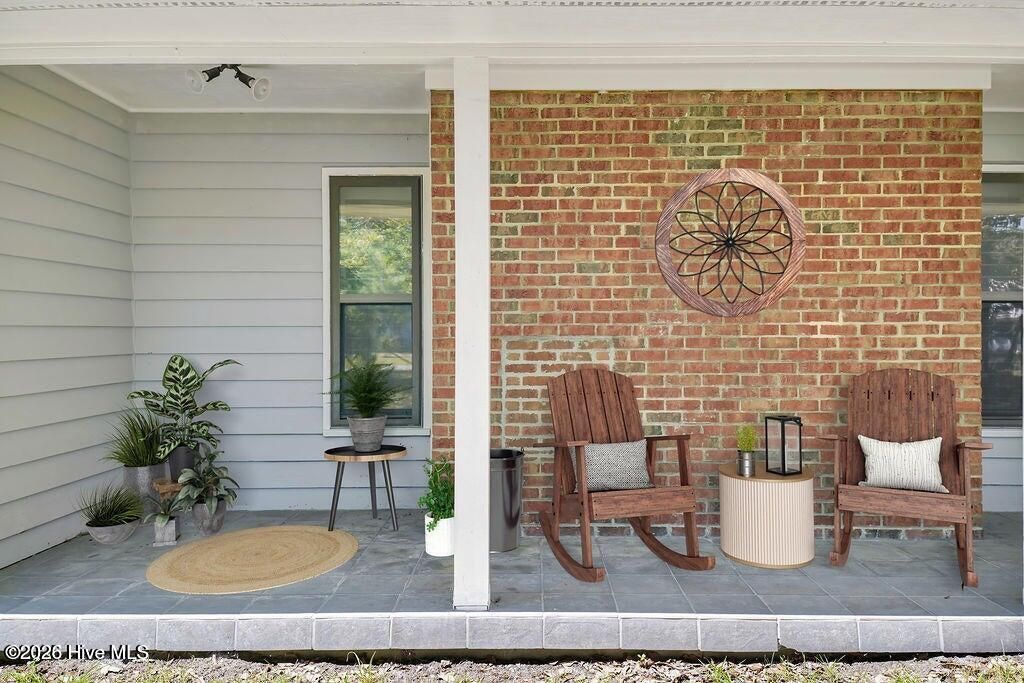 Photo of 207 Whispering Pines Court, Hampstead, NC 28443 (MLS # 100557409)