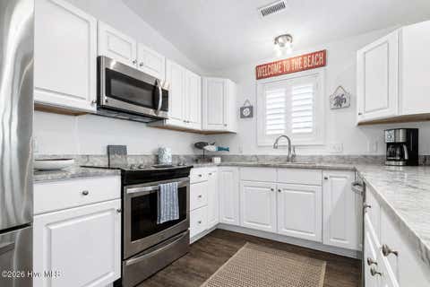Tiny photo for 413 27th Street #C, Sunset Beach, NC 28468 (MLS # 100597902)