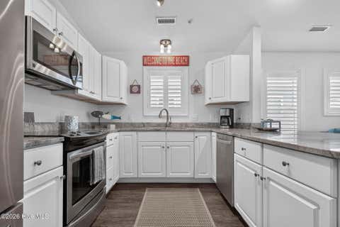 Tiny photo for 413 27th Street #C, Sunset Beach, NC 28468 (MLS # 100597902)