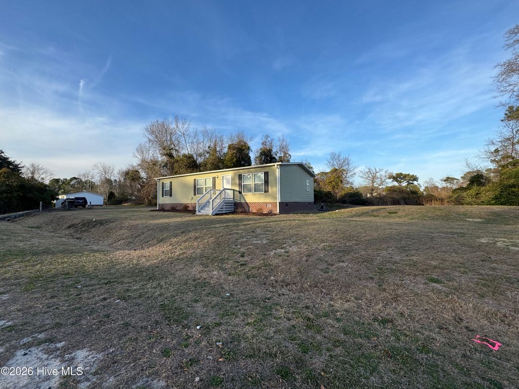 Photo of 113 Moores Landing Road, Hampstead, NC 28443 (MLS # 100560408)