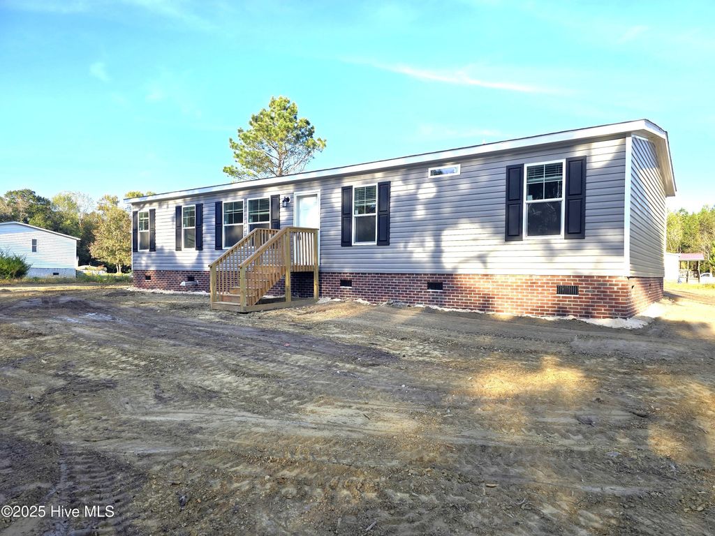 Photo of 405 S Alligator Lane, Willard, NC 28478 (MLS # 100535678)