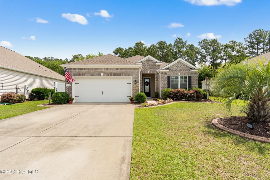 Photo of 3110 Crescent Lake Drive, Carolina Shores, NC 28467 (MLS # 100574052)