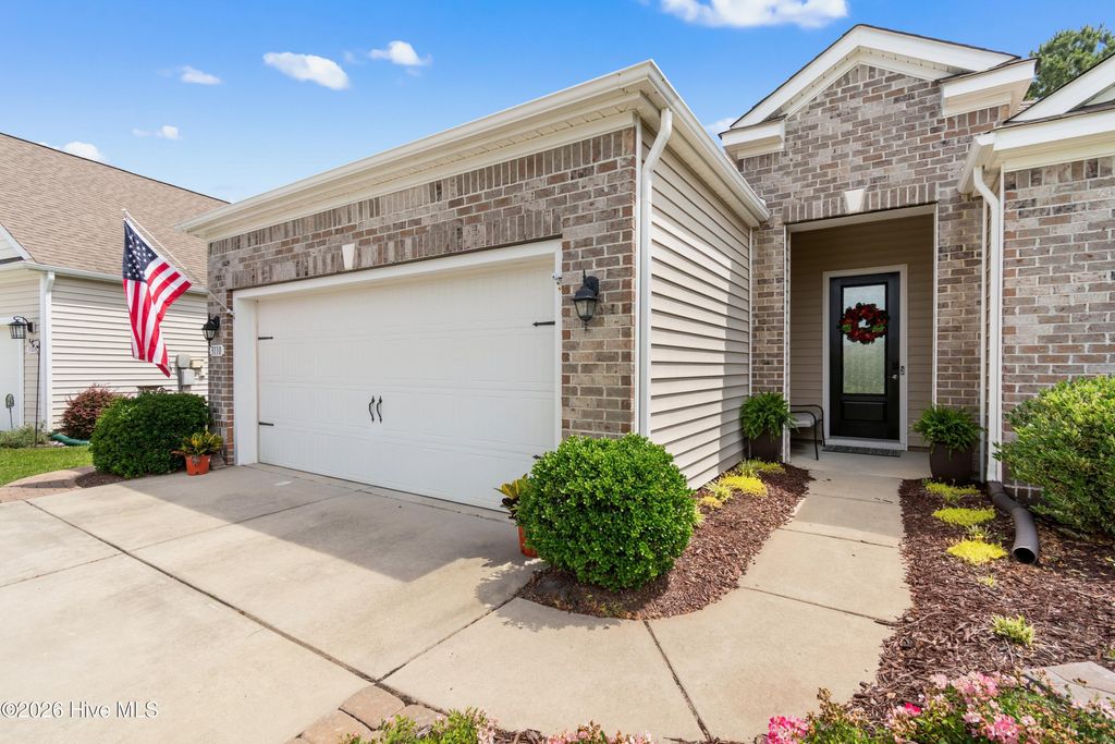 Photo of 3110 Crescent Lake Drive, Carolina Shores, NC 28467 (MLS # 100574052)